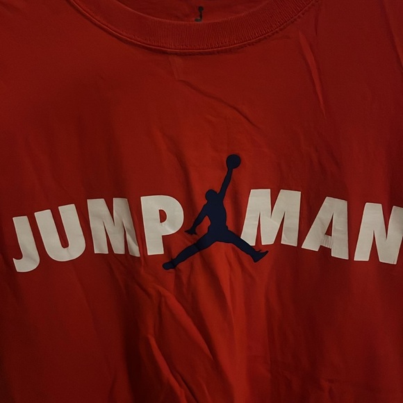Red shirt with blue jump man letters - Picture 2 of 4